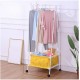 Metal Clothes Hanger with Built-In Fabric Storage Box geen box